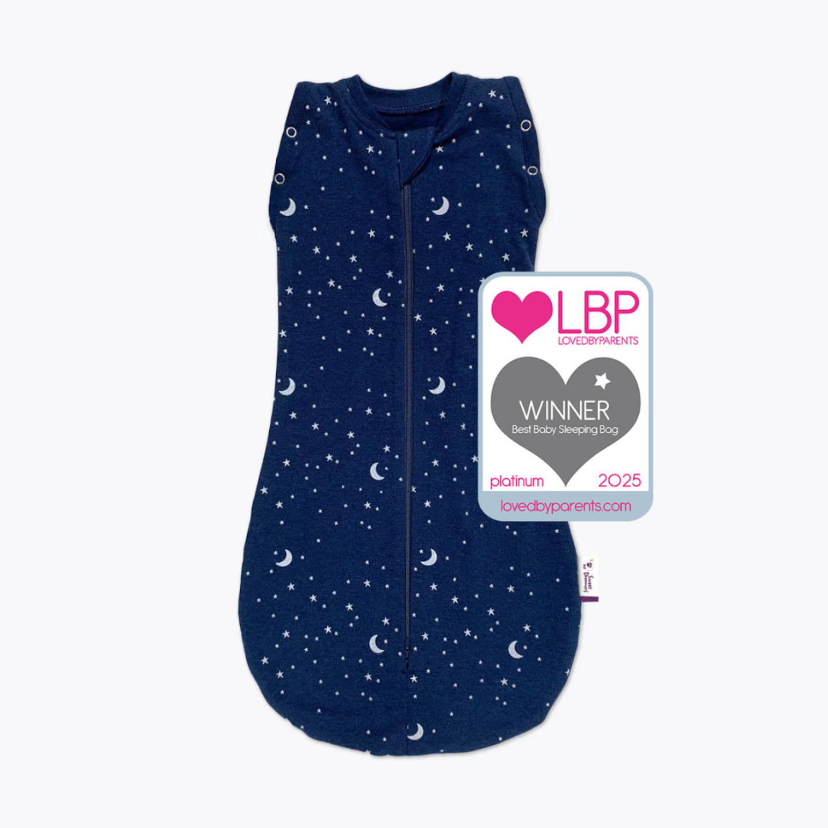 A navy blue baby sleep Sweet Dreamers Sleep & Swaddle Transition Bag with a white crescent moon and star print, shown flat against a white background with a LBP award badge overlaid on the right side.