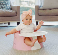 Baby in Bumbo floor seat