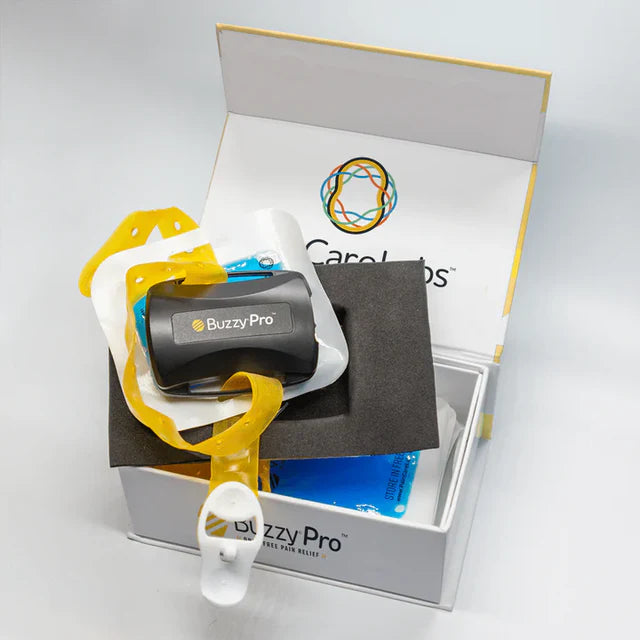 Needle distraction device for reducing injection pain in children and adults